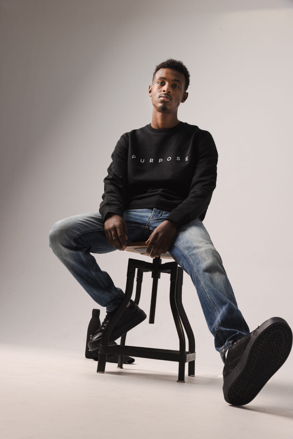 Black PURPOSE sweater